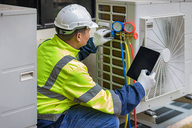 Professional Hvac technician working in Middle Island, NY